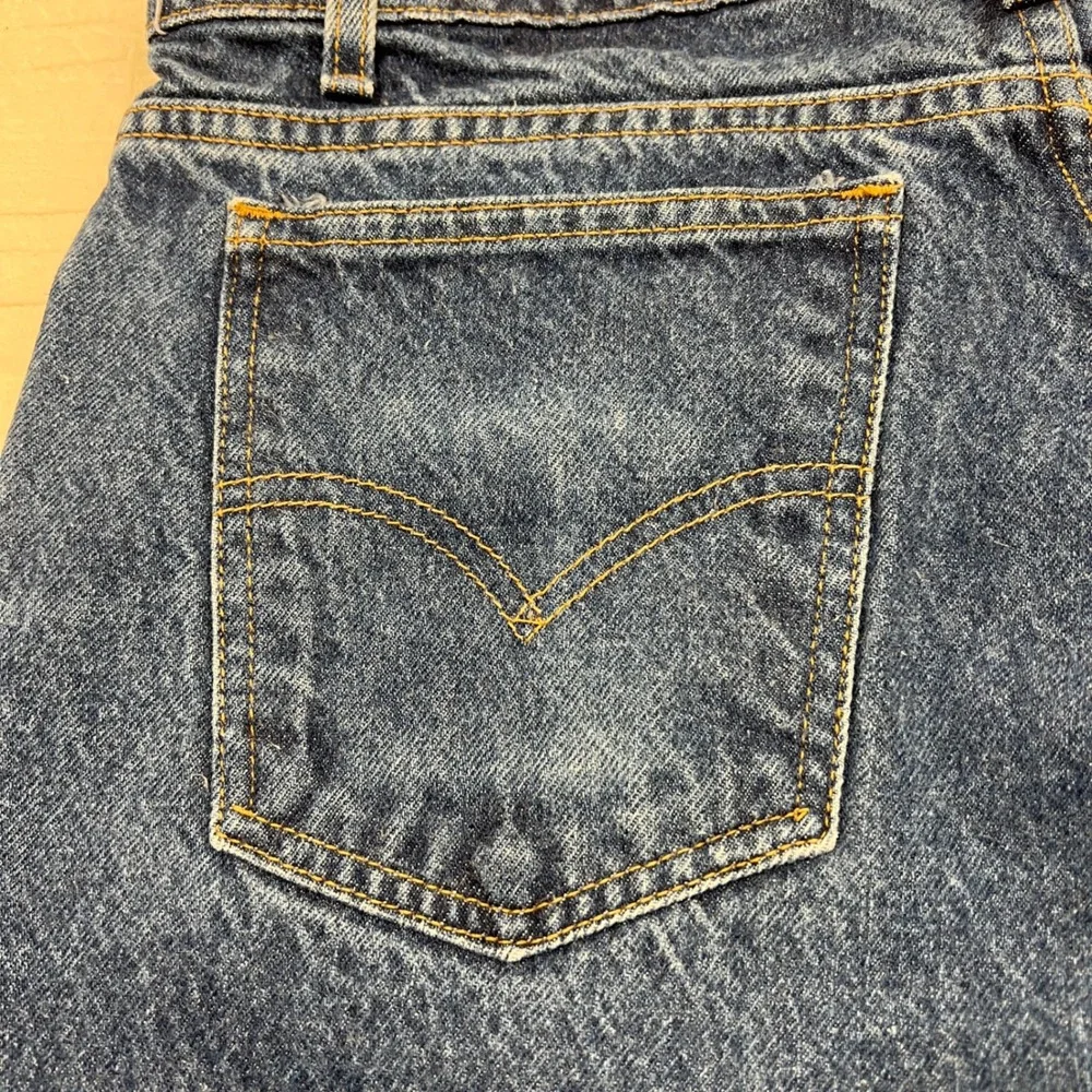 Vintage 90's Levis 550 Orange Tab Relaxed Fit Tapered Jeans 36x34 Medium Wash